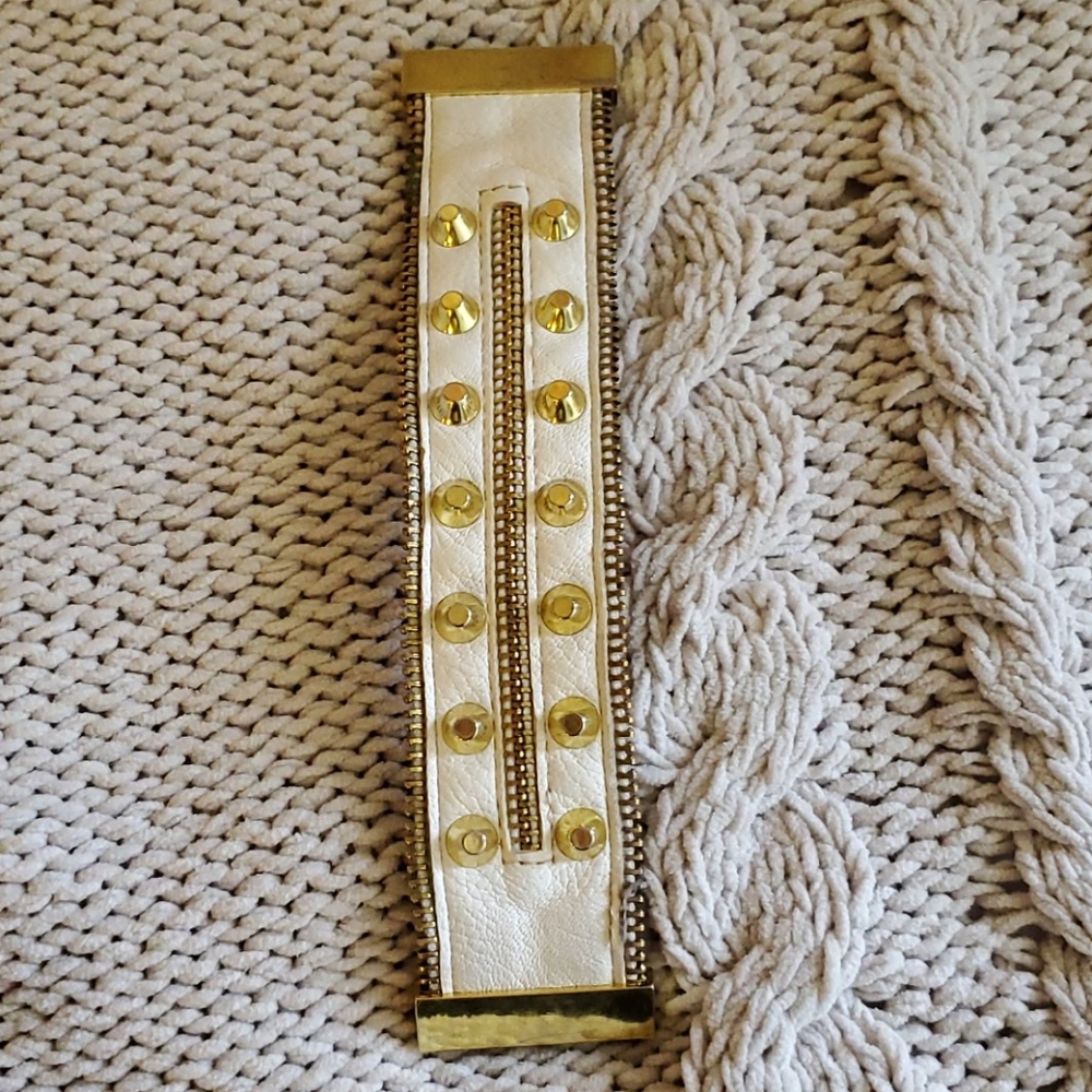 White and gold studded bracelet
